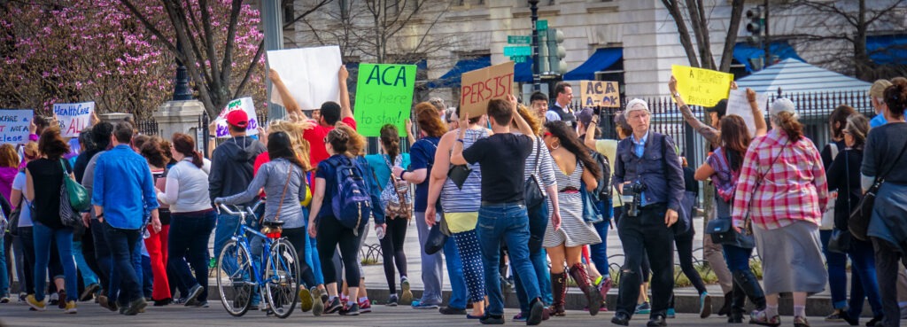 Health care, 
[[File:2017.02.25 Rally in Support of Affordable Care Act -ACA Washington, DC USA 01297 (33071184596).jpg|2017.02.25_Rally_in_Support_of_Affordable_Care_Act_-ACA_Washington,_DC_USA_01297_(33071184596)]
