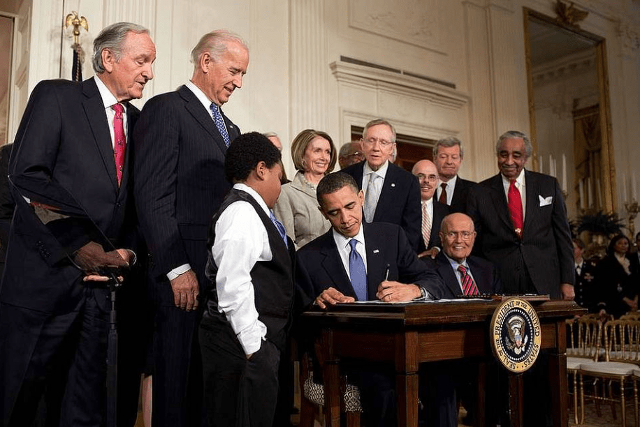 Obama signs Affordable Health Care Act in 2010.