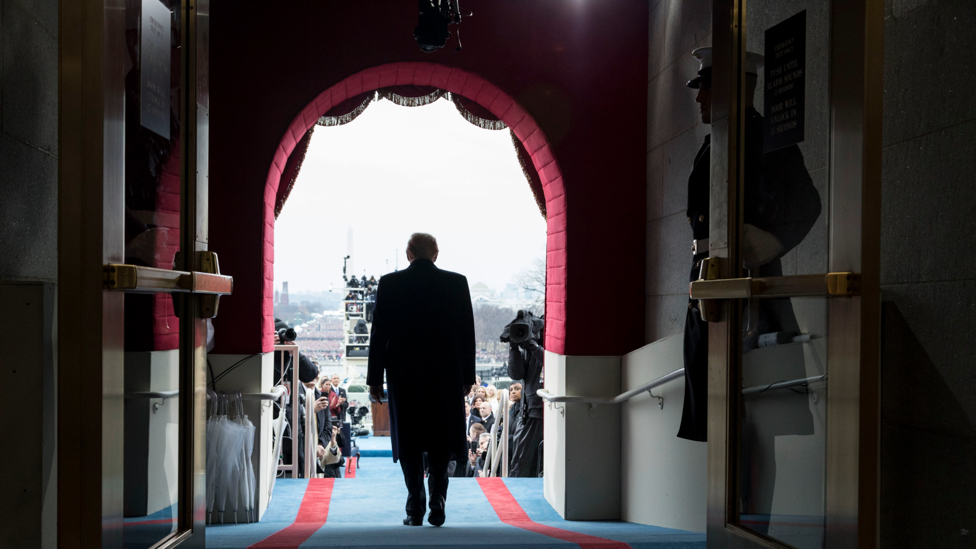 Donald Trump walks to take his seat for the inaugural swearing-in ceremony at the U.S. Capitol in Washington, D.C., Friday, January 20, 2017.