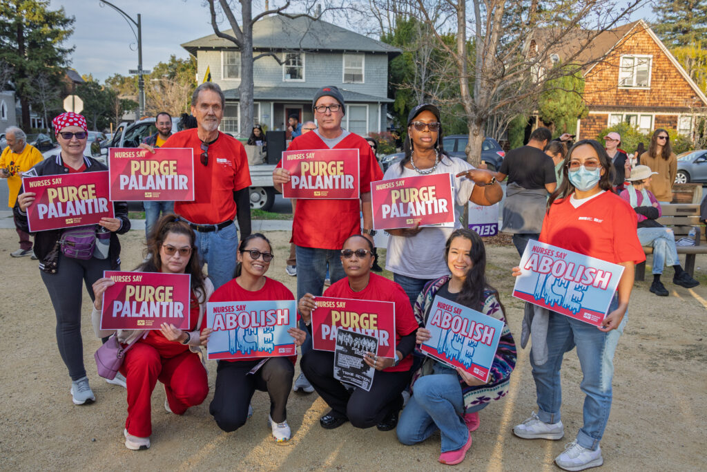 Palantir. NNU Nurses of California by ICE out of Santa Clara County, Feb 7, 2026. (ProBonoPhoto.org/Jesse Kornblum via CC-NC-BY-4.0 license)